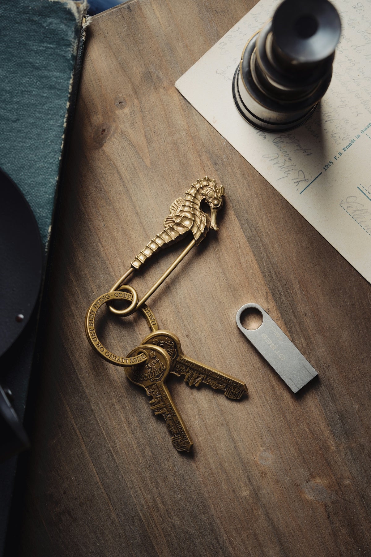 a bunch of keys sitting on top of a wooden table